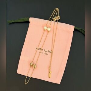 New Kate Spade faux pearls and open flower bead long station necklace